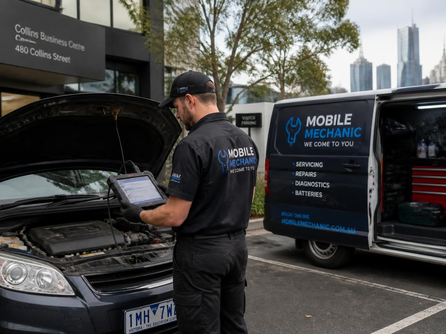 Mechanic repairing a car at a workplace in Melbourne